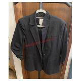 black blazer is from the brand Cinq à Sept.size