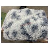 UGG  fur throw blanket (garage side room)