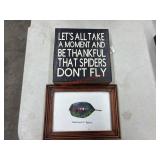 Wooden picture frame and sign (garage side room)