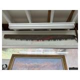 Two man pole saw (garage side room )