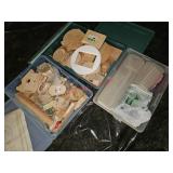 Three totes with lids and contents- under house