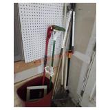 Yard Tools and mops in corner (Garage)