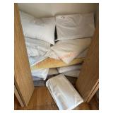 large lot of pillows      (Entry way closet)