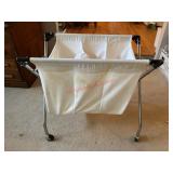 Rolling 3 compartment hamper. Needs washed