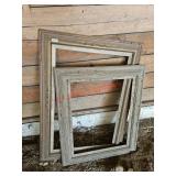 Vintage wooden frames - right of garage