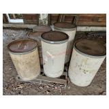 Cardboard barrels- right of garage