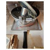 Baking, cooking pans, left of the garage