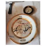Two lovely owl plates, left of garage