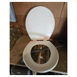 Toilet seat- garage