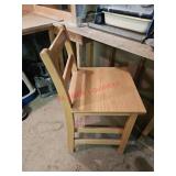 Heavy wooden chair- basement left room