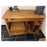 Wood Cabinet used as desk with power strip