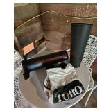 Attachment for Toro lawn vacuum- garage