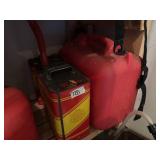 Two metal One Plastic Gas cans with contents