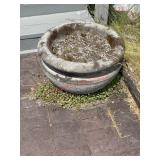 planter (out front of first house )