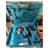 Makita Drill with batteries and charger