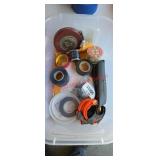Tub of tape  (garage 1 table)