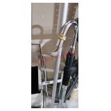 Shoe rack, pole and watering wand garage