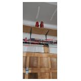 Ski's poles and bootsGarage one