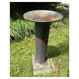 Pedestal of some sort             (Behind Pump