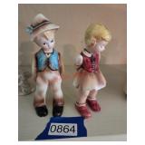 Pair of Boy and Girl Figurines