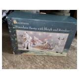 Porcelain Santa with Sleigh and reindeer Decor