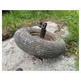 Wheel barrel tire       (Right Side of barn)