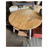 wooden table no chairs (left side barn)