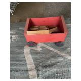 red wooden wagon (left side barn)