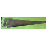 vintage hand saw (stairwell area)