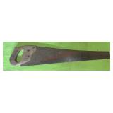 vintage hand saw (stairwell area)