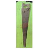 vintage hand saw (stairwell area)