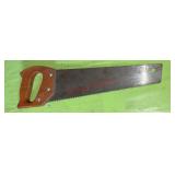 vintage hand saw (stairwell area)