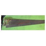 vintage hand saw (stairwell area)