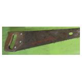 vintage hand saw (stairwell area)