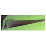 vintage hand saw (stairwell area)