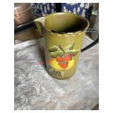 vintage American Folk Art tole ware pitcher (left
