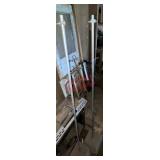 metal poles with cement blocks (left side barn)