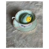 tea cup and saucer (left side barn)