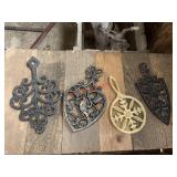 Lot of 4 metal Trivets, Brass/ Cast Iron