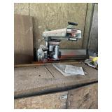 Craftsman 10-inch radial arm saw(left side barn)