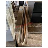 wooden walking cane (left side barn)