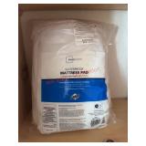 Mattress pad ( back room)