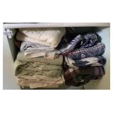 Shelf lot of bed sheets