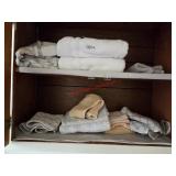 Towels and more in this closet (Bathroom)