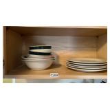 Shelf lot of plates and bowls