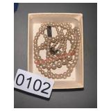 Necklace needs repair (front bedroom)