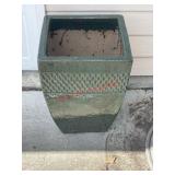 Large planter (by garage door)