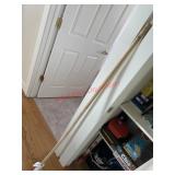 Stick of some sort (back hallway)
