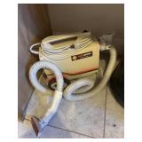 Small Vacuum                   (Laundry Room)