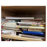 Shelf lot of cook books               (kitchen)